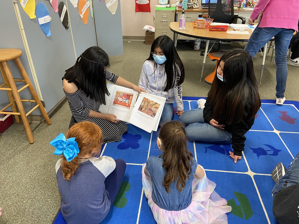 WCHS students reading to kindergarten students 