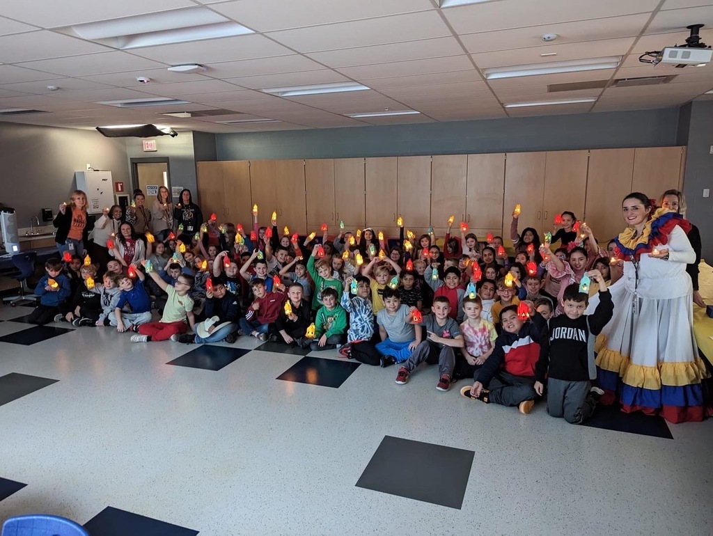 “Third graders holding their lanterns for the traditional “Colombian Day of the Little Candles’”