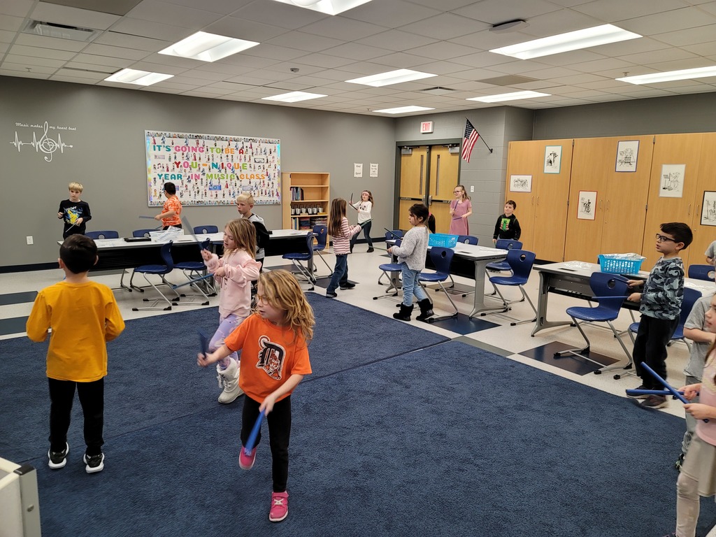 1st grade students playing rhythm patterns while listening and moving to a song about Dr. King.