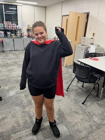 Student with cape